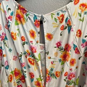 Torrid floral romper. Soft and flowy with open shoulders